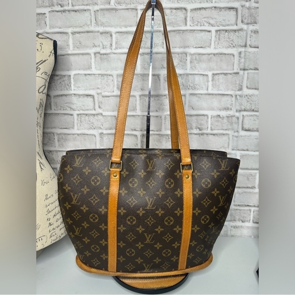 SOLD Louis Vuitton Monogram Babylone Shoulder Bag
Brown Coated Canvas Leather S